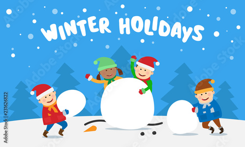 children playing snowballs and making snowman. winter holidays