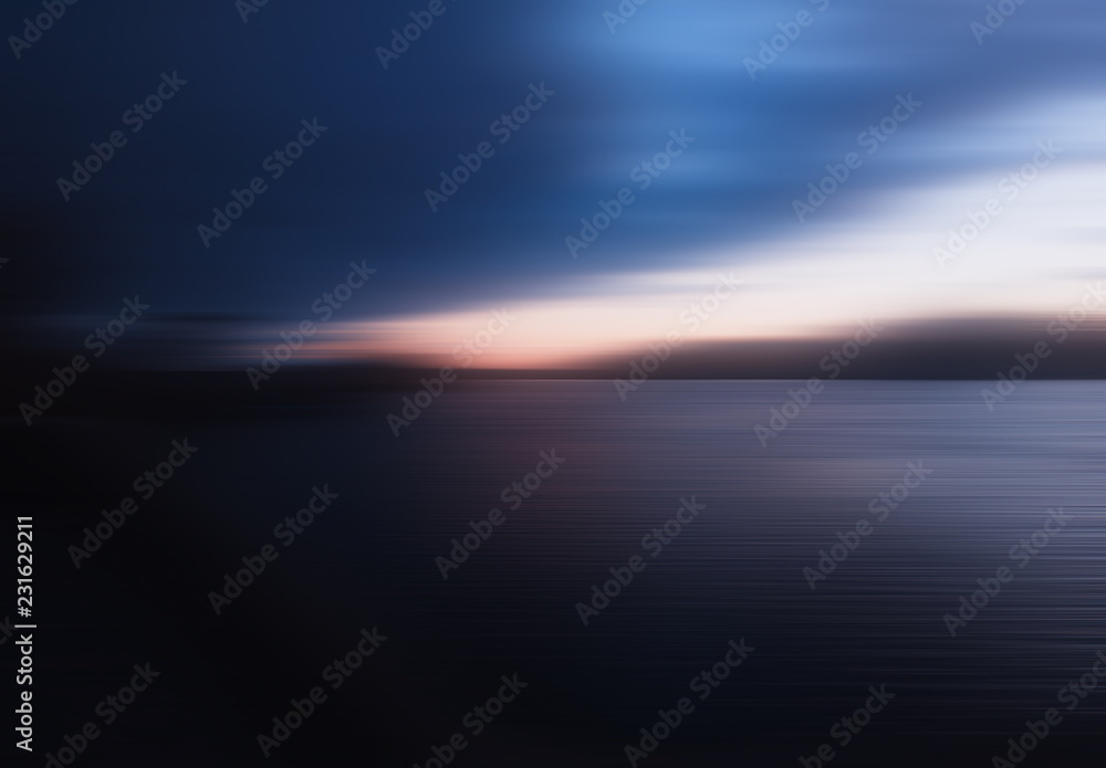 Horizontal motion blur sunset on river background