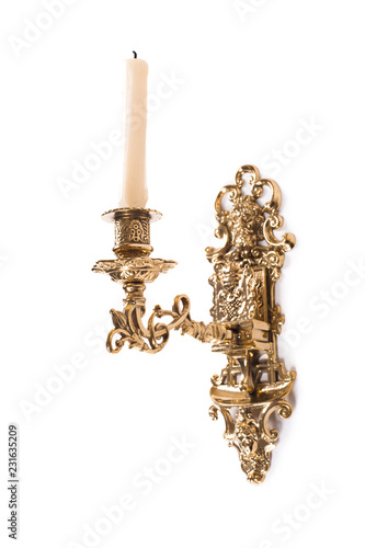 Gold wall candle holder on a white background