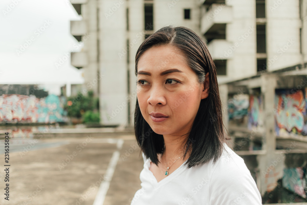 Tourist woman enjoy explore an unknown abandoned building. Tourist woman enjoy explore an unknown abandoned building.