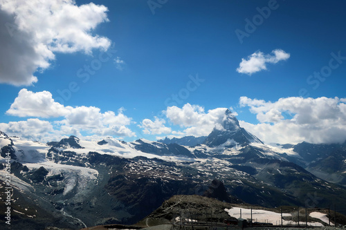 Scenic bright view of Matterhorn and clouds around, Swiss Alps near Zermatt