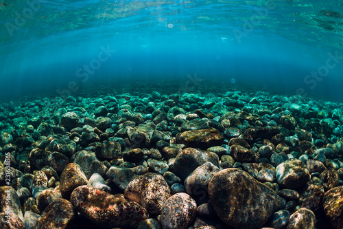 Fototapeta Naklejka Na Ścianę i Meble -  Underwater scene with stones, copy space. Ocean texture
