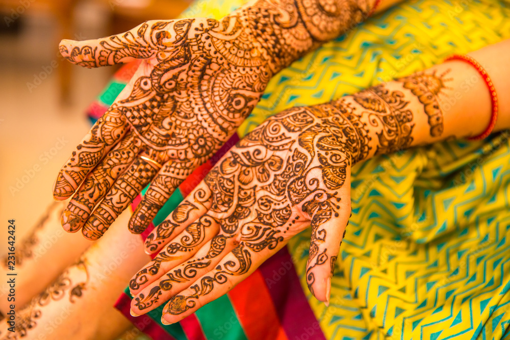 Mehndi Hands of an Indian Bride, tattooed with natural and local dye