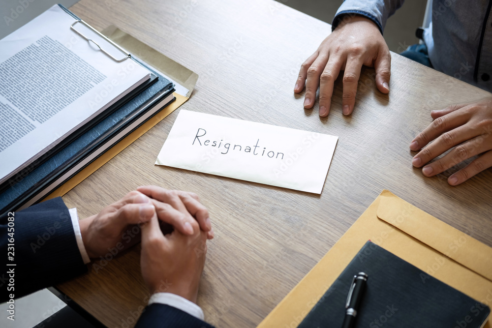 Businessman sending a resignation letter to employer boss in order to dismiss contract, changing