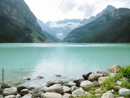 Lake Lousie - Rocky Cost with mountian background (inkl. Free Space) photo