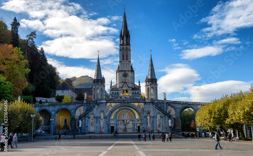 Vászonkép view of the basilica of Lourdes in autumn, France