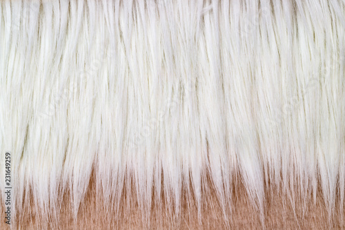 winter white fur jackets  fashion background, close up detail. Soft faux fur