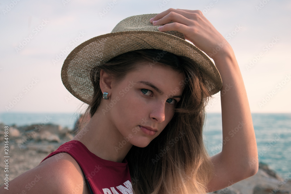 portrait of young woman in hat