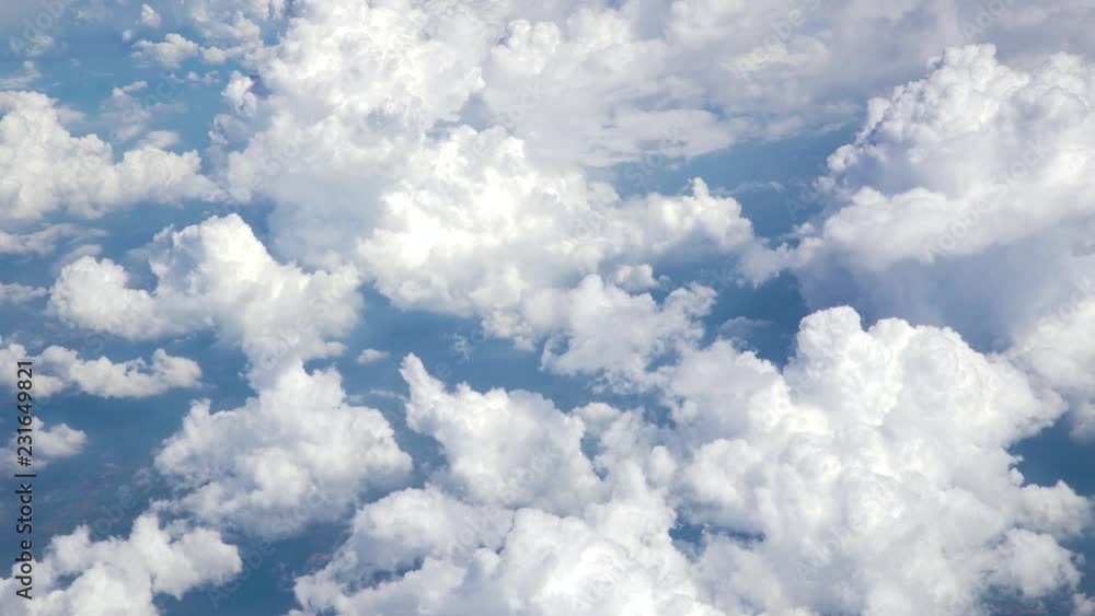 From airplane look through window above cloud before raining From airplane look through window above cloud before raining