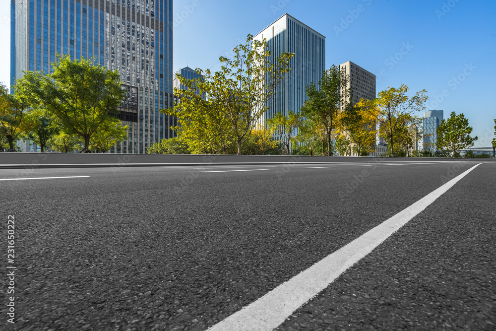 cityscape and skyline from empty asphalt road