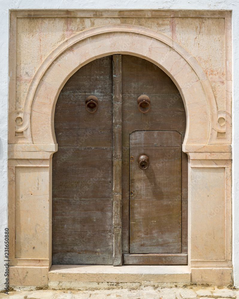 Aged door in Andalusian style from Sidi Bou Said