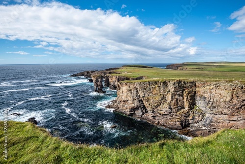 The cliffs of Yesnaby with the 35m high surf pillar, called Yesnaby Castle Sandwick, Mainland, Orkney Islands, Scotland, Great Britain photo