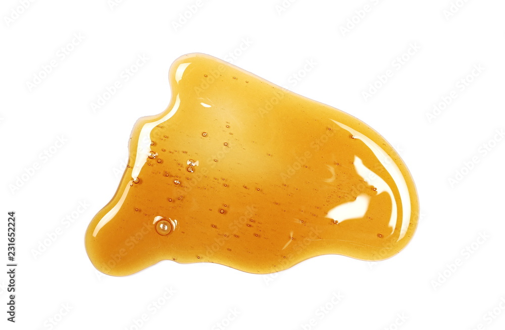 Honey isolated on white background, top view Honey isolated on white background, top view