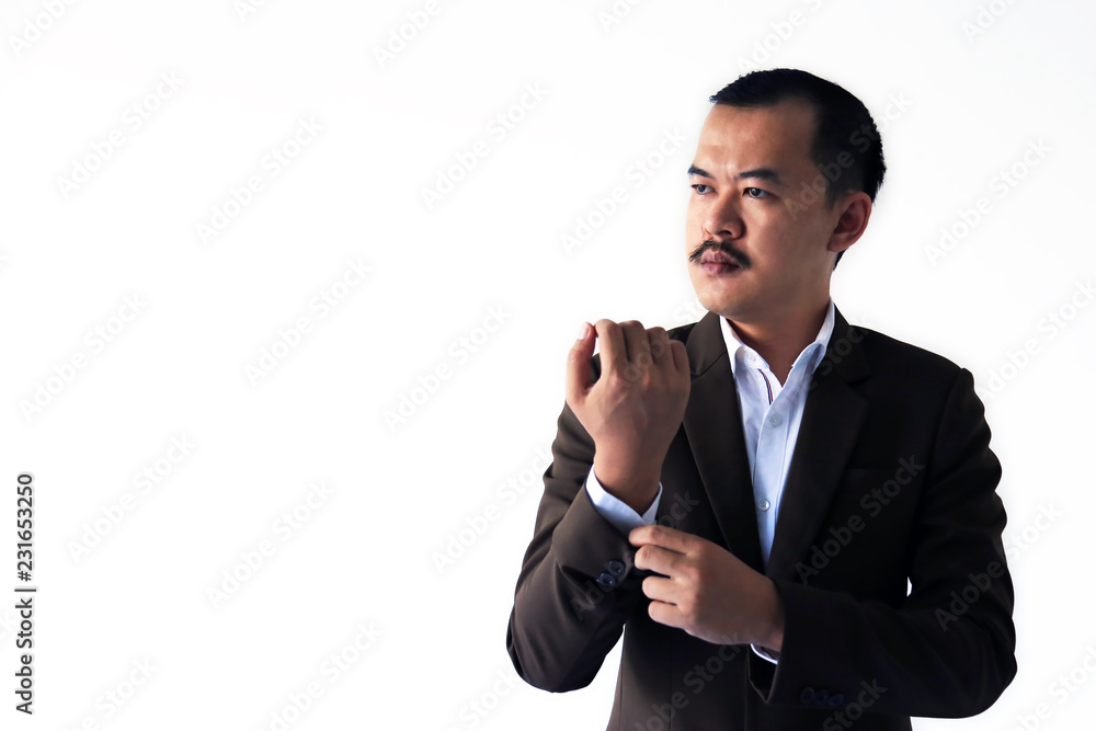 Asian businessman with mustache holding his shirt posting and looking to empty space isolated in white background. Marketing tactics or situation analysis concept. Asian businessman with mustache holding his shirt posting and looking to empty space isolated in white background. Marketing tactics or situation analysis concept.