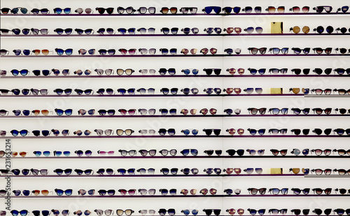Sunglasses background.Various sunglasses in stores
