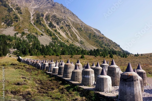 Panzersperre, defence system Plamort, World War II, to protect Italy from Nazi Germany, near Biotop Plamorter moss, raised bog, at Reschenpass, Vinschgau, South Tyrol, Italy, Europe photo