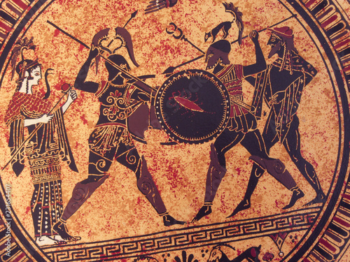 Detail from an old historical greek paint. Mythical heroes and gods fighting on it photo