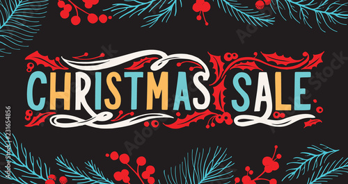 Christmas sale chalkboard background with holiday decorations.