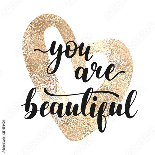 You are beautiful - black hand written lettering with golden heart shape isolated on white background. Modern vector design, decorative inscription, motivational poster.