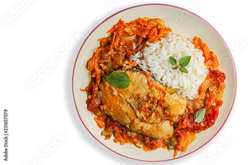 fish with tomato sauce, aroma spices and white rice, isolated on white