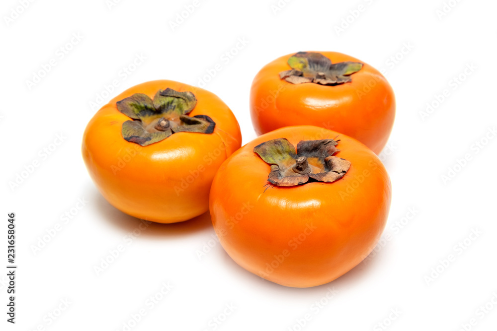 Group of Fresh Persimmon on iSolated White Background. Healthy Fruit Group of Fresh Persimmon on iSolated White Background. Healthy Fruit