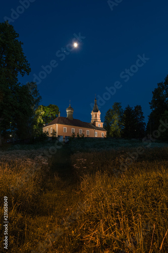 Old Orthodox church by night. Mostowlany. Podlachia. Poland. Wooden Uniate Orthodox church in Poland from 1863. photo