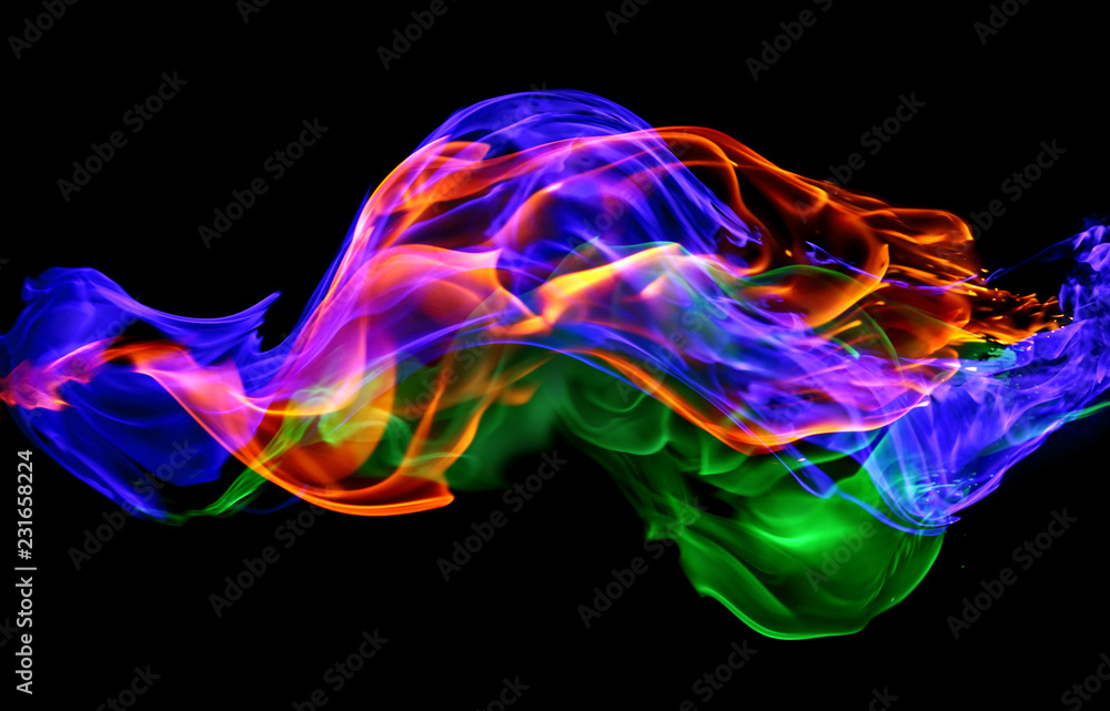 Fire - a wave of colored plasma fire elements consisting of a hot red-orange flame on a black background - a magical colored background for poster design Fire - a wave of colored plasma fire elements consisting of a hot red-orange flame on a black background - a magical colored background for poster design
