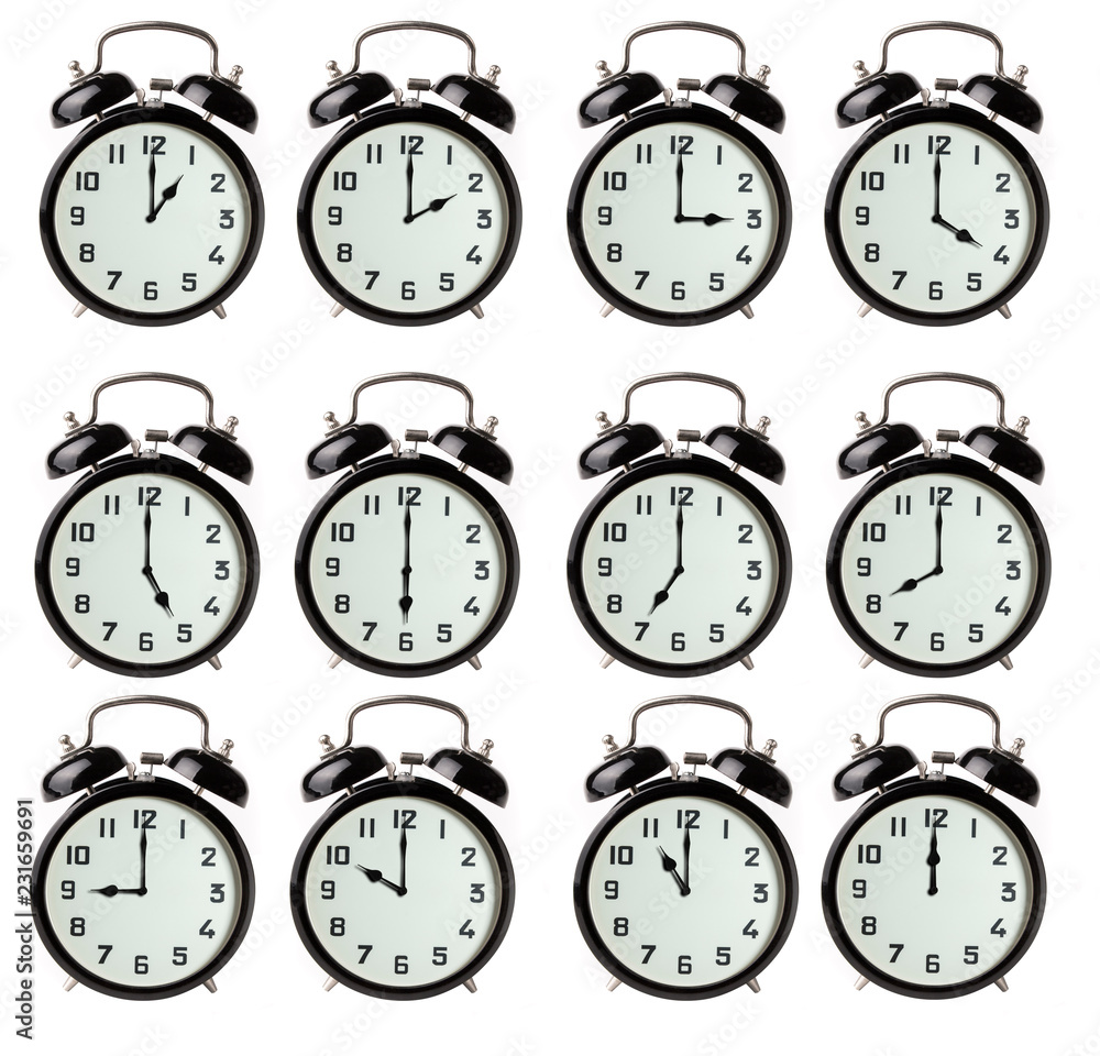 Iconic alarm clocks showing different hours isolated on white Iconic alarm clocks showing different hours isolated on white