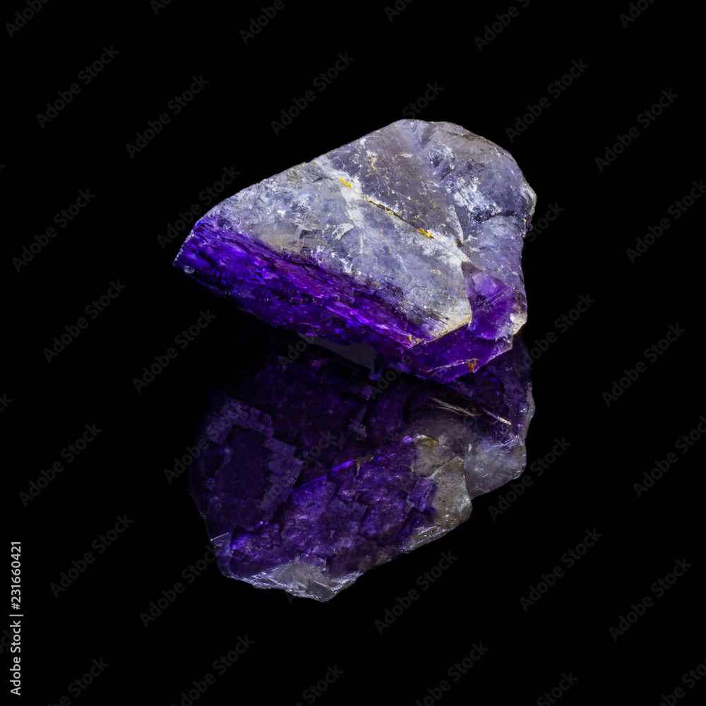 Natural untreated stone fluorite on a black backround Natural untreated stone fluorite on a black backround