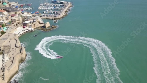 Following an Extreme jetboat at sea - Aerial footage photo