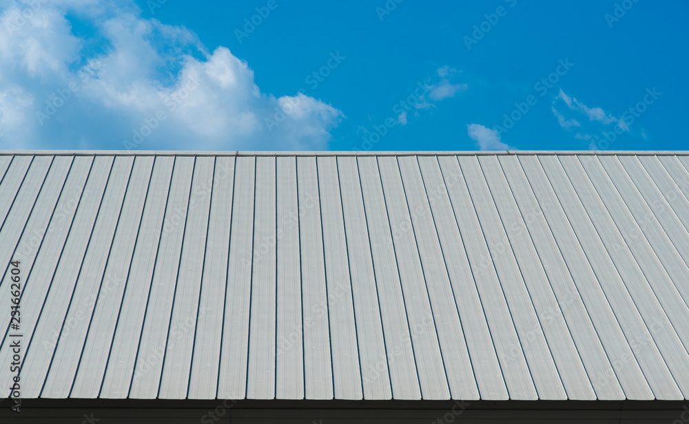 Metal sheet for industrial roof and blue sky. - obrazy, fototapety, plakaty 