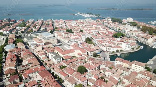 Aerial approach of Basilica in Grado, Italy. photo