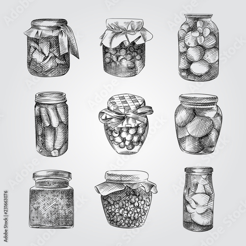 Set of Hand Drawn glass jars of picked vegetables and fruits. Collection Of decorative glass canning jars. Jar Sketches isolated on white background.