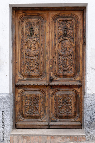 antique wooden carved door © il.Tor