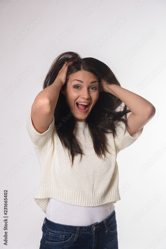 White caucasian girl posing emotionally isolated on background White caucasian girl posing emotionally isolated on background