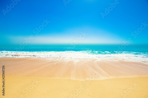 Fototapeta Naklejka Na Ścianę i Meble -  Beach, sand and blue ocean. Panoramic Summer Background.  Copy space
