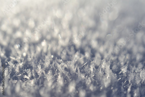 Snow crystals macro, shallow depth of field. Festive winter background for your design. © eternal aviv