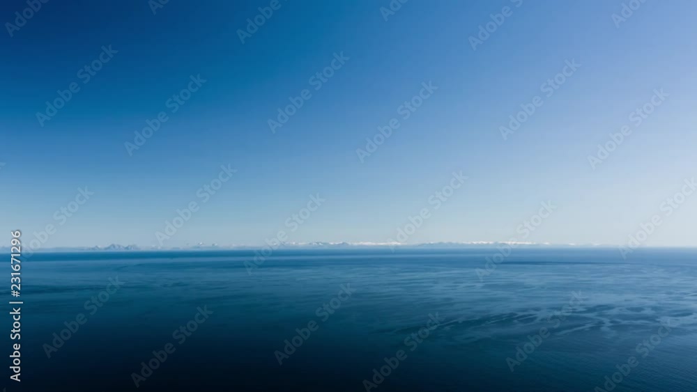 The Norwegian sea and mainland Norway as seen from the Lofoten islands on a clear summer day. The Norwegian sea and mainland Norway as seen from the Lofoten islands on a clear summer day.