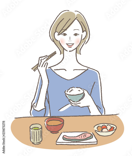 食事する女性