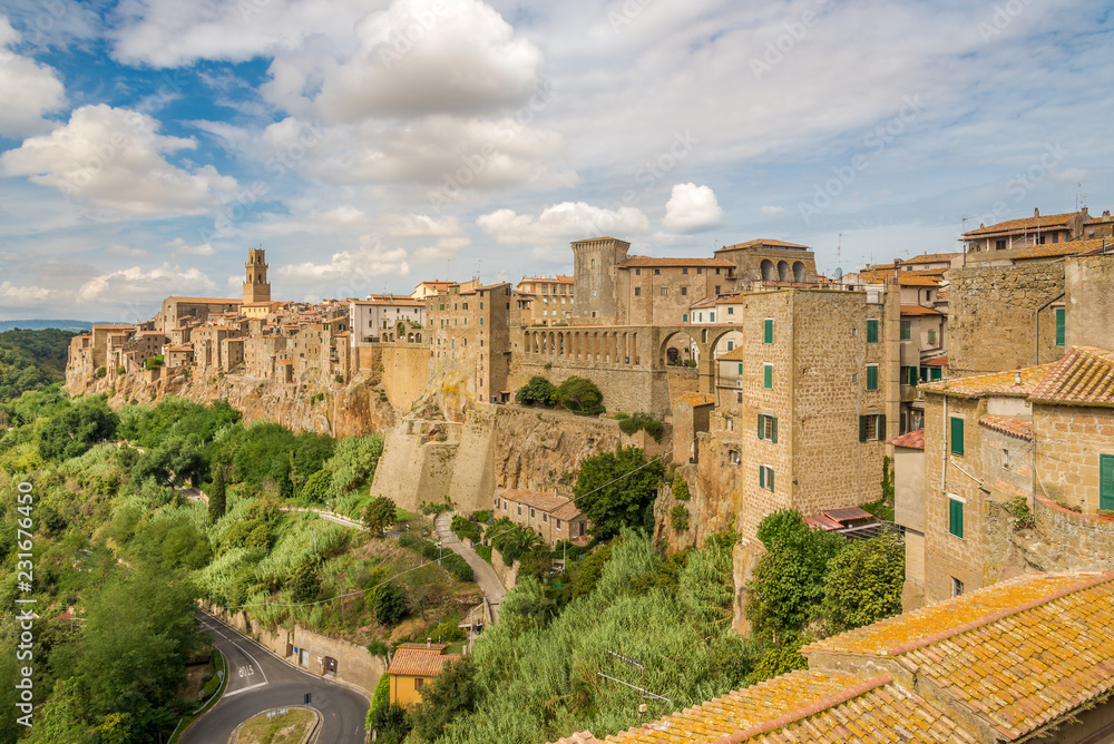 View at the old stone buildings in Pitigliano town - Italy