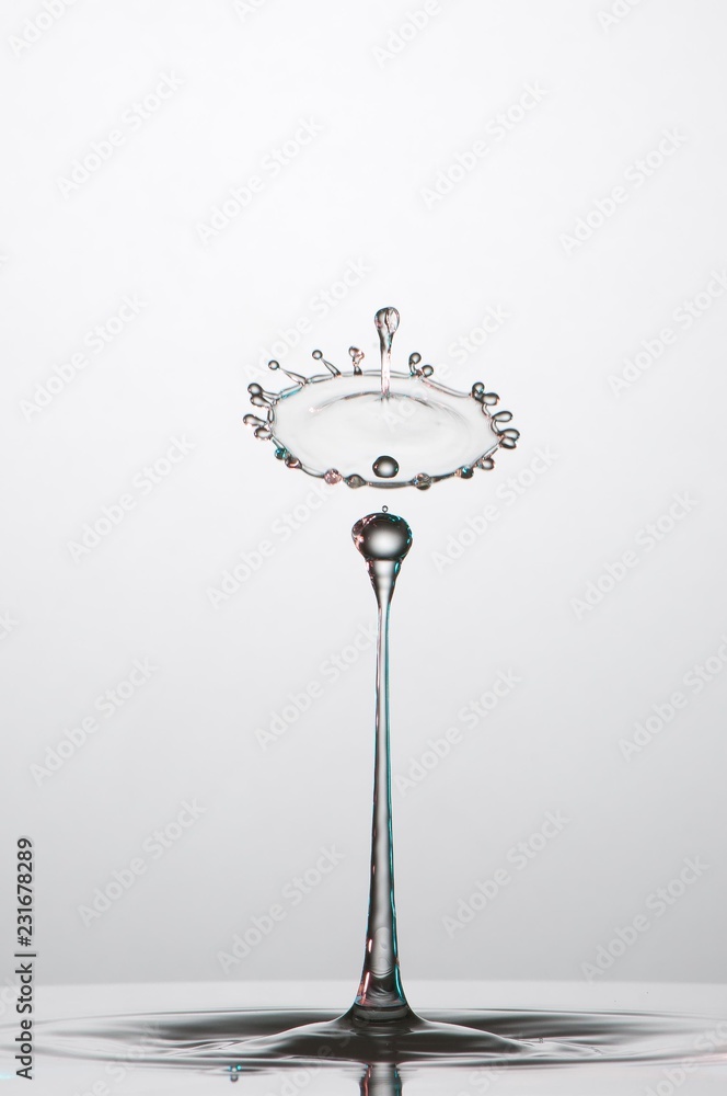 Splash of colorful liquid with high speed flash Splash of colorful liquid with high speed flash