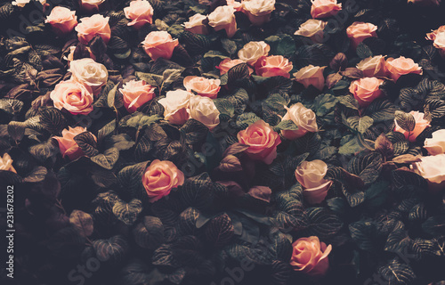 Fototapeta Naklejka Na Ścianę i Meble -  Artificial Flowers Wall for Background in vintage style