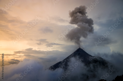 Eruption of volcano Fuego at sunset.