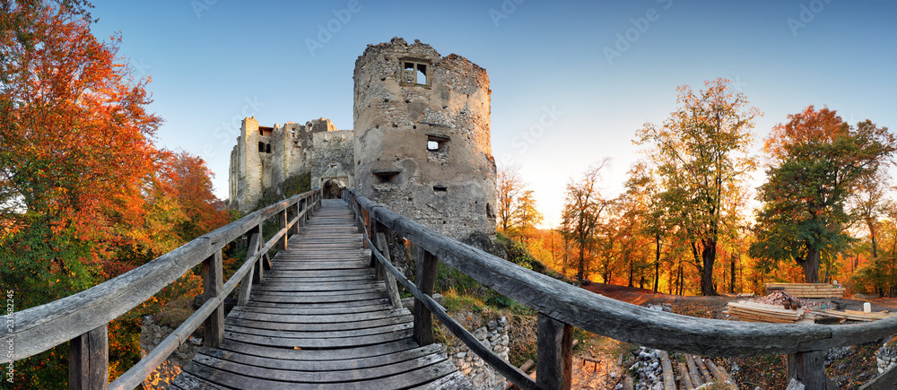 Beautiful Slovakia landscape at autumn with Uhrovec castle ruins at sunset