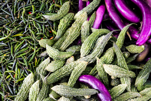 Fresh small Eggplants, Beans and Chillies on a local Farmers Market near Inle Lake, Myanmar photo
