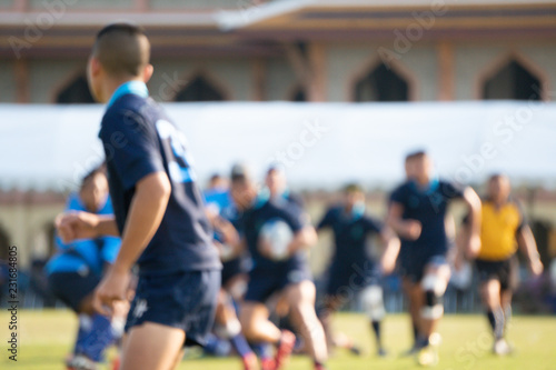 Blurred background image of school rugby game © Mongkolchon