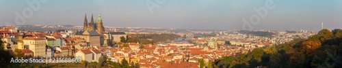 Prague - The panorama of the Town with the Castle and St. Vitus cathedral in evening light.