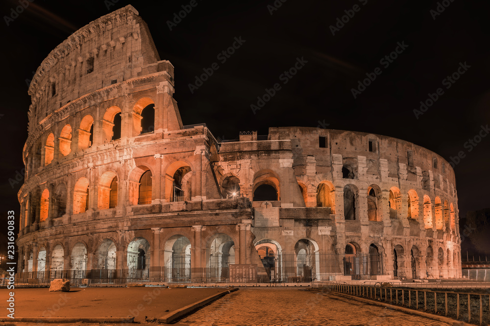 Coliseum in Rome by Night -  Colosseum is one of the main travel attractions - The Main symbol of Rome