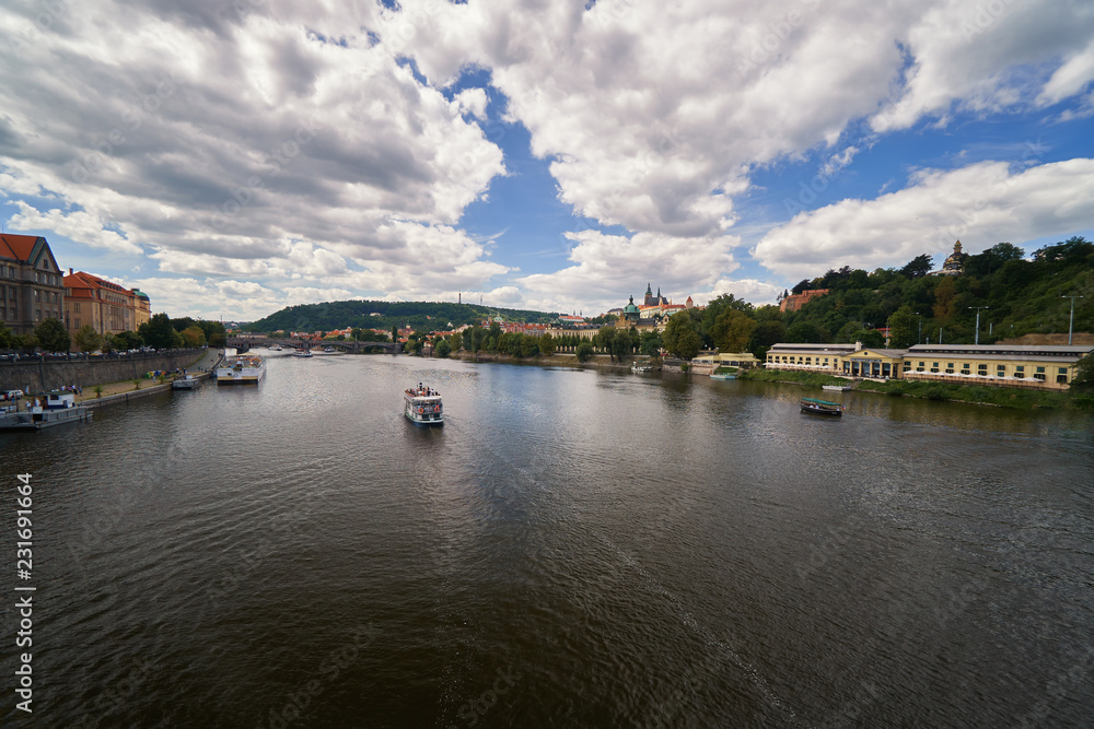 Vltava river with ships, skyline Czech republic medievil historical landmark