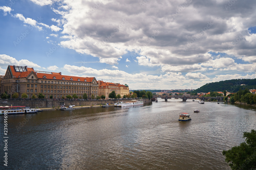 Famous Vltava river canal with ships, skyline Czech republic medievil historical landmark